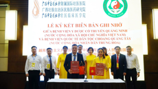 附属国际壮医医院与越南广宁传统医药医院签署合作备忘录